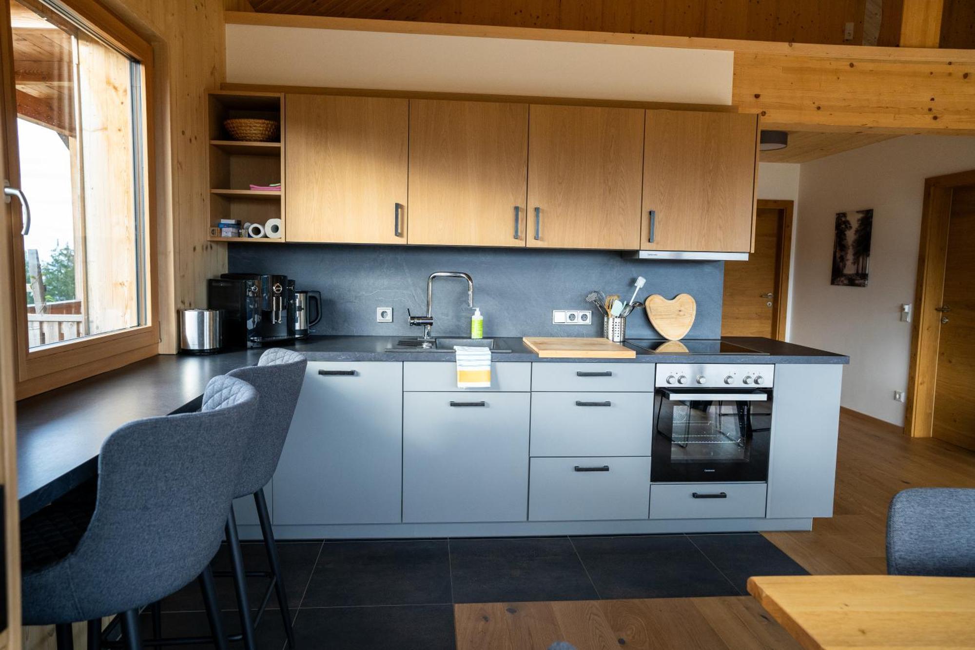 Holzhaus "Zum Schwarz'N" Apartamento Aurach am Hongar Exterior foto