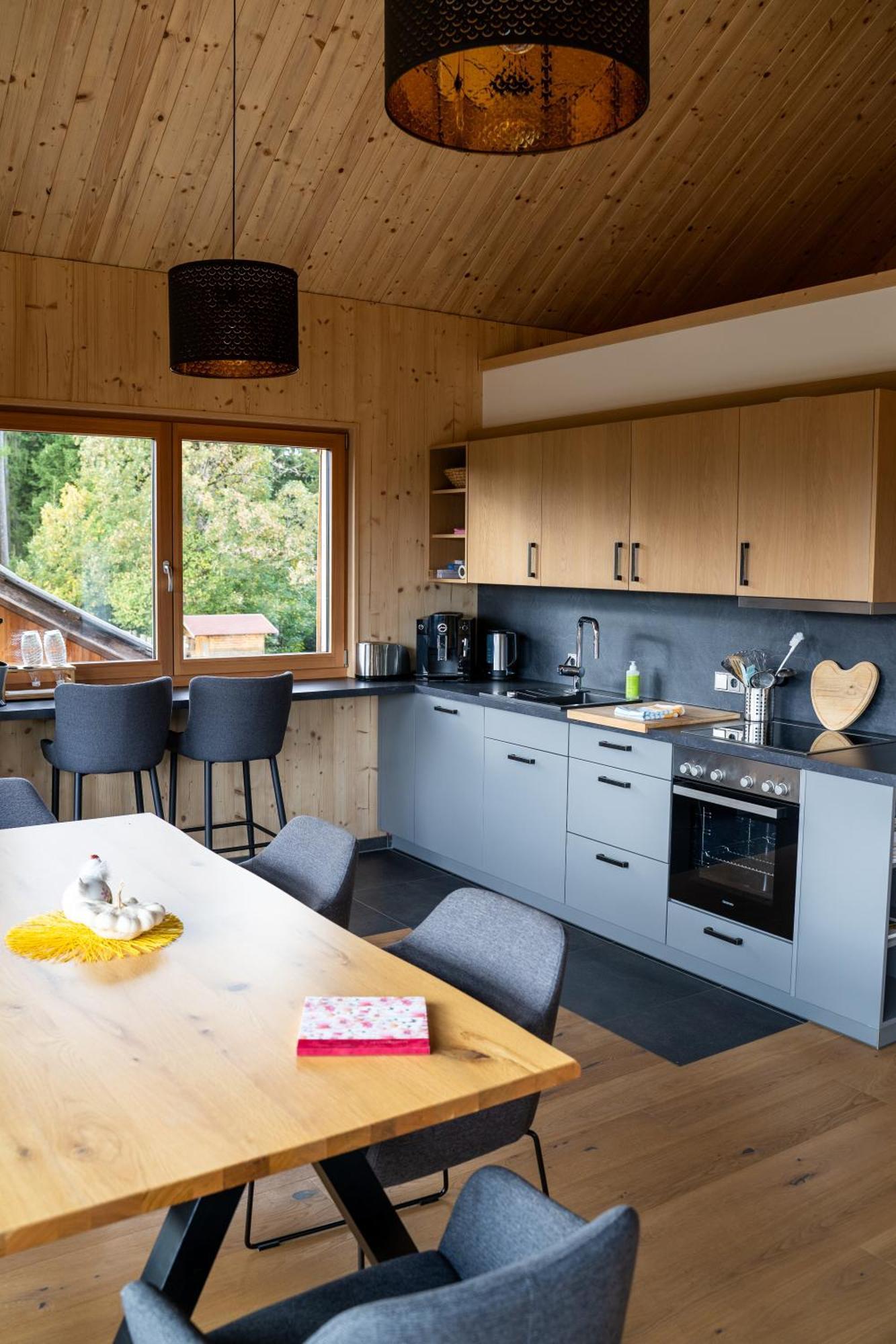 Holzhaus "Zum Schwarz'N" Apartamento Aurach am Hongar Exterior foto